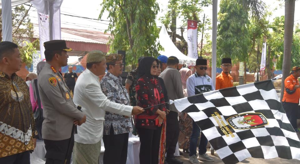 Lewat Kirab Pemilu, Bupati Imron Ajak Masyarakat Salurkan Hak Pilihnya